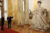 The President of the Curia shows the Statue of Lady Justice